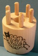Bobbin with 6 wooden pegs
