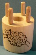 Bobbin with 4 wooden pegs